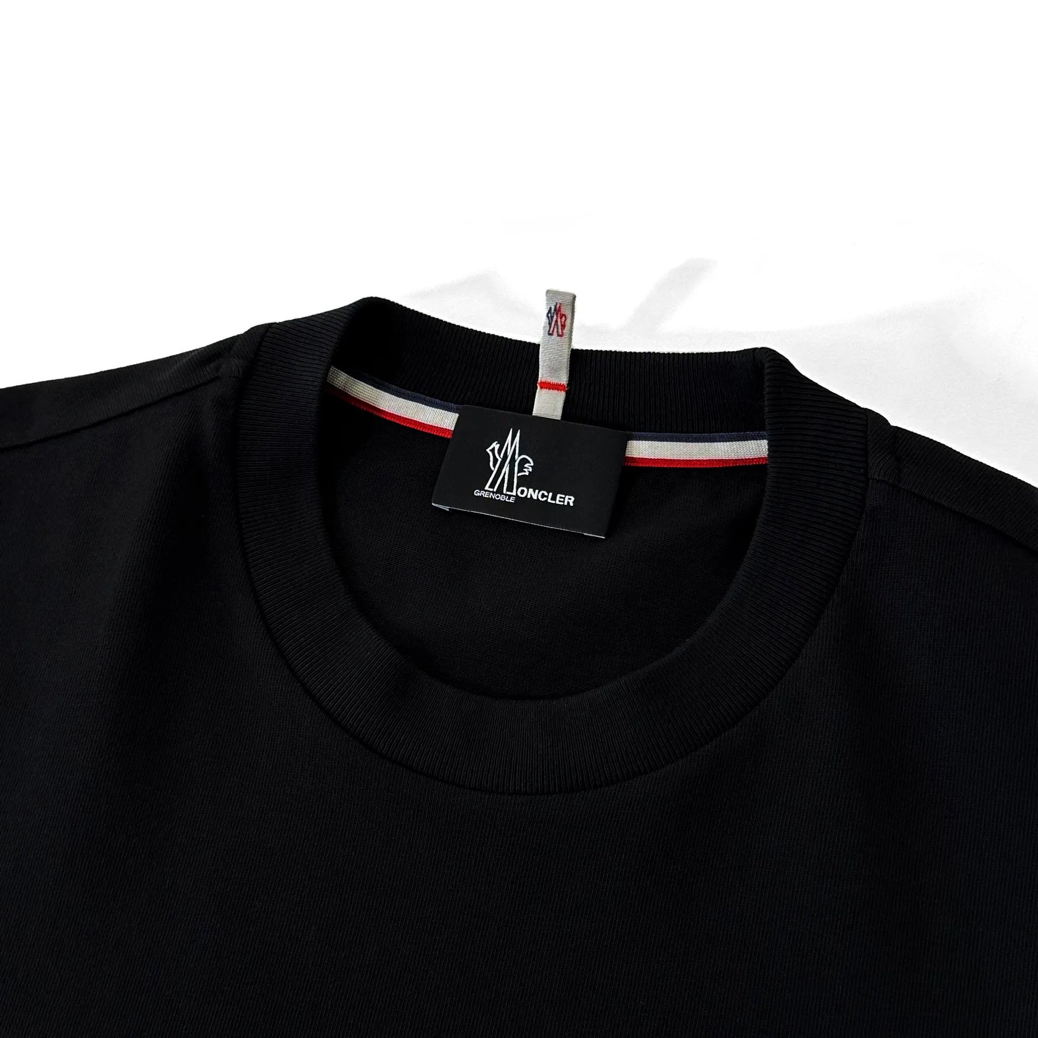 Moncler logo tees with long sleeves.