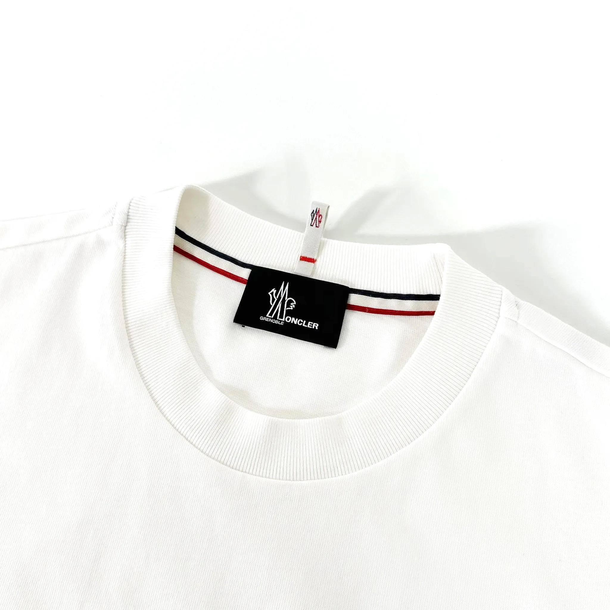 Moncler logo tees with long sleeves.